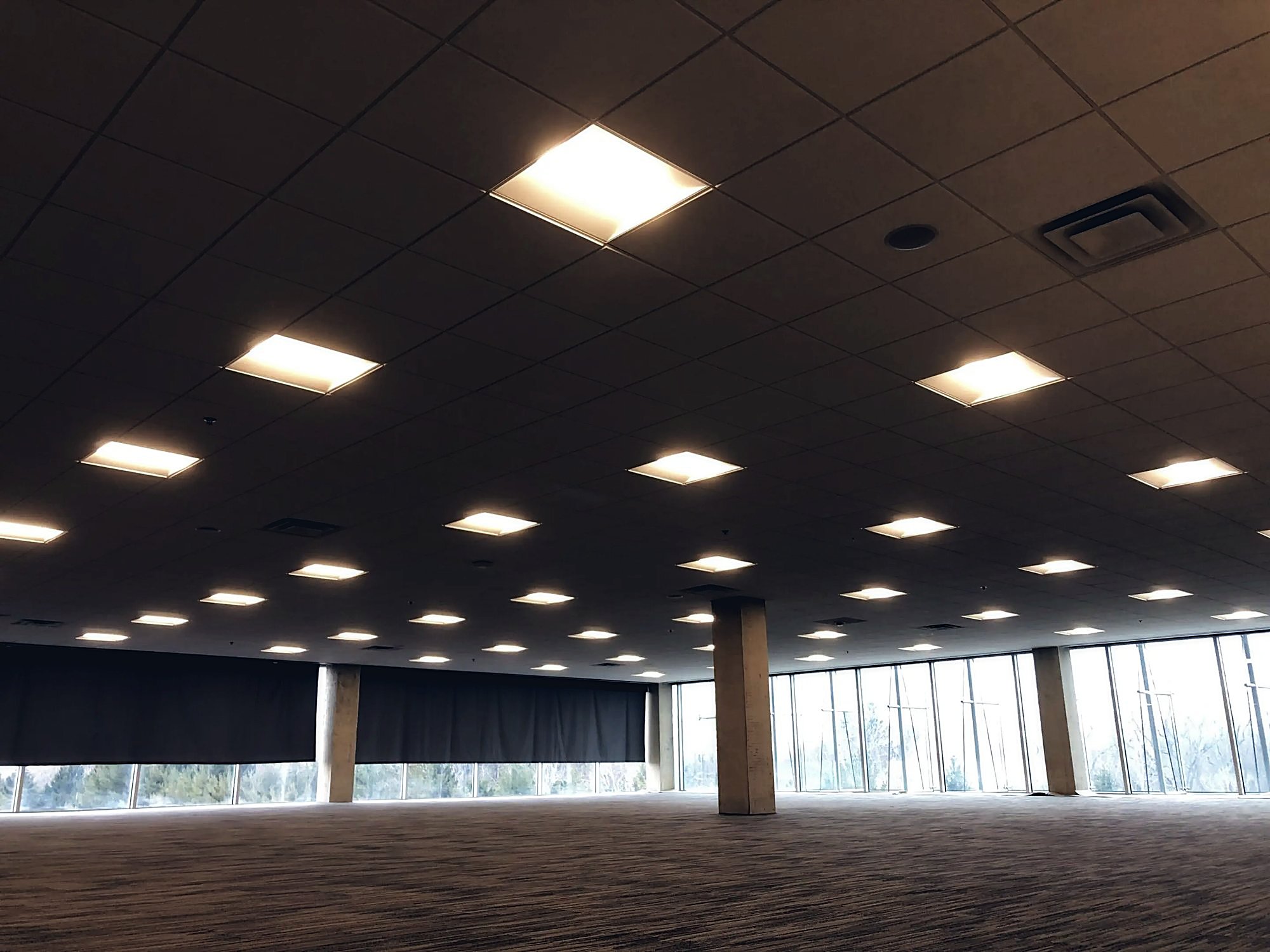 Acoustical ceiling field installed by RELCO across a full commercial floor plate